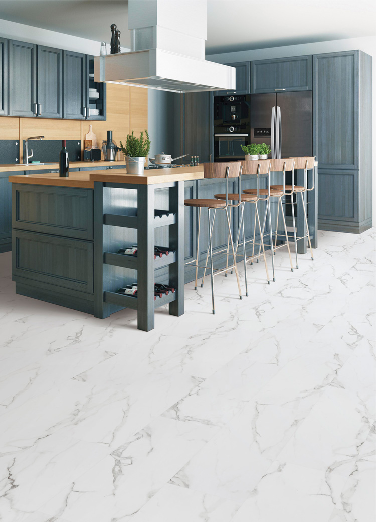 luxury vinyl tile flooring in kitchen with blue cabinetry.